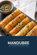 Cover image for MANDUBRE cookbook featuring golden-brown banitsa cigars over a dark blue title block.